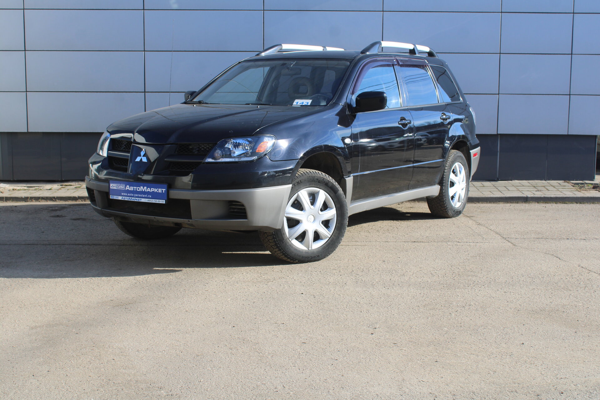 Черный Mitsubishi Outlander 2.4 AT (160 л.с.) 4WD 2003