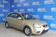 бежевый Kia Rio 1.4 AT (97 л.с.) 2010 фото 2