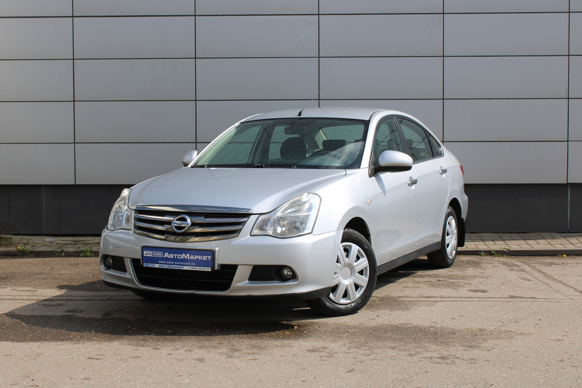 Серый Nissan Almera 1.6 AT (102 л.с.) 2014