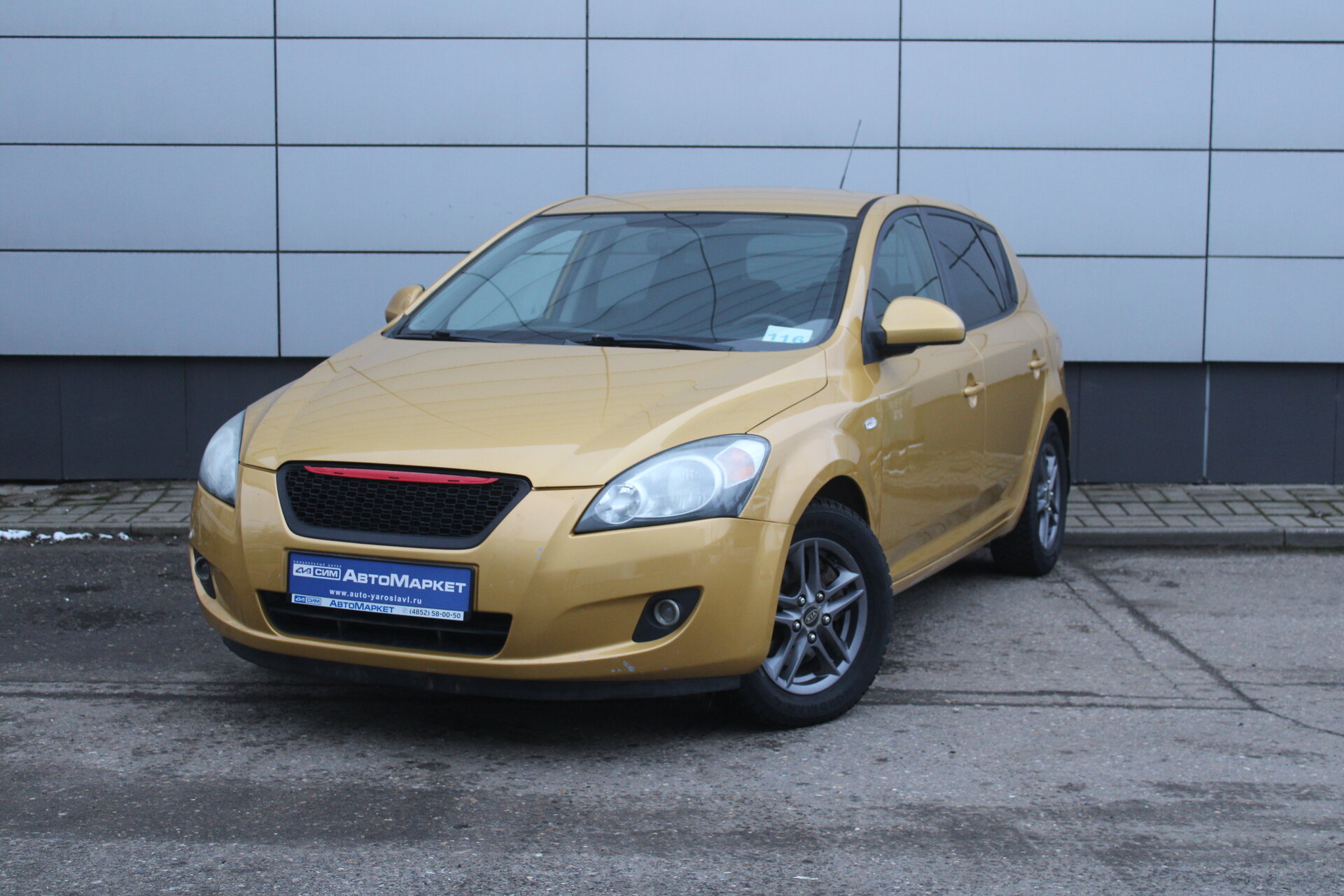 Желтый Kia Ceed, I 1.6 MT (122 л.с.) 2009