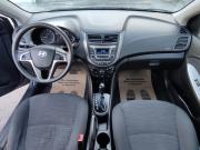 серый Hyundai Solaris 1.4 AT (107 л.с.) 2016 фото 4