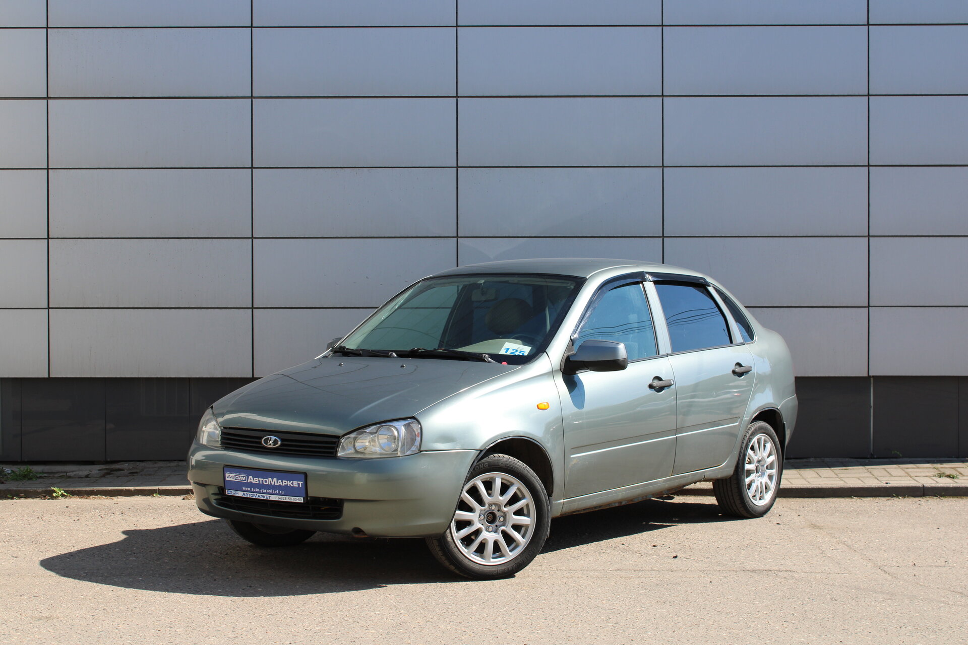 Серый Lada (ВАЗ) Kalina 1.6 MT (81 л.с.) 2010