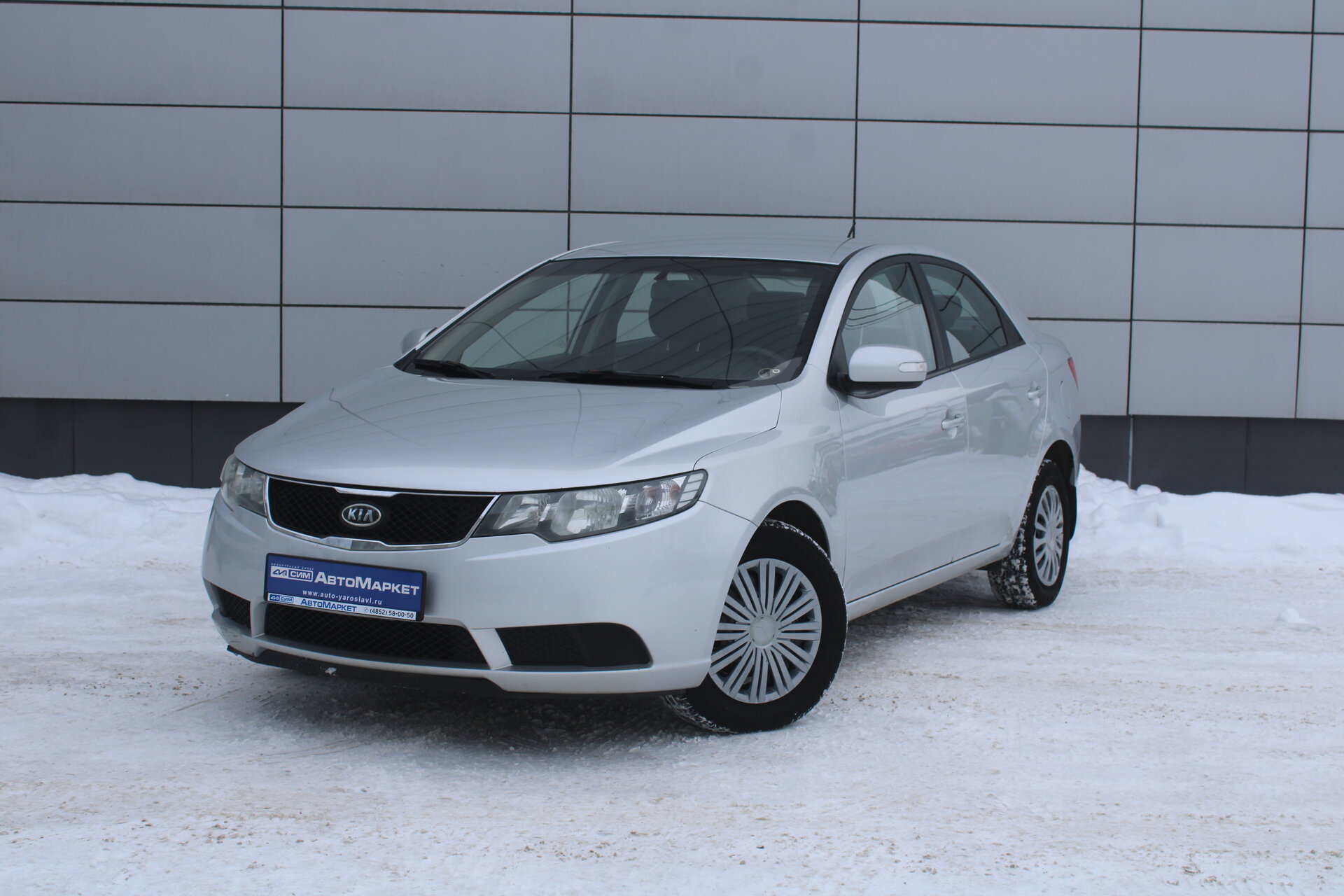 Серый Kia Cerato, II 5-speed 1.6 MT (126 л.с.) 2010