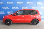 красный Ford Fusion 1.4 MT (80 л.с.) 2009 фото 3