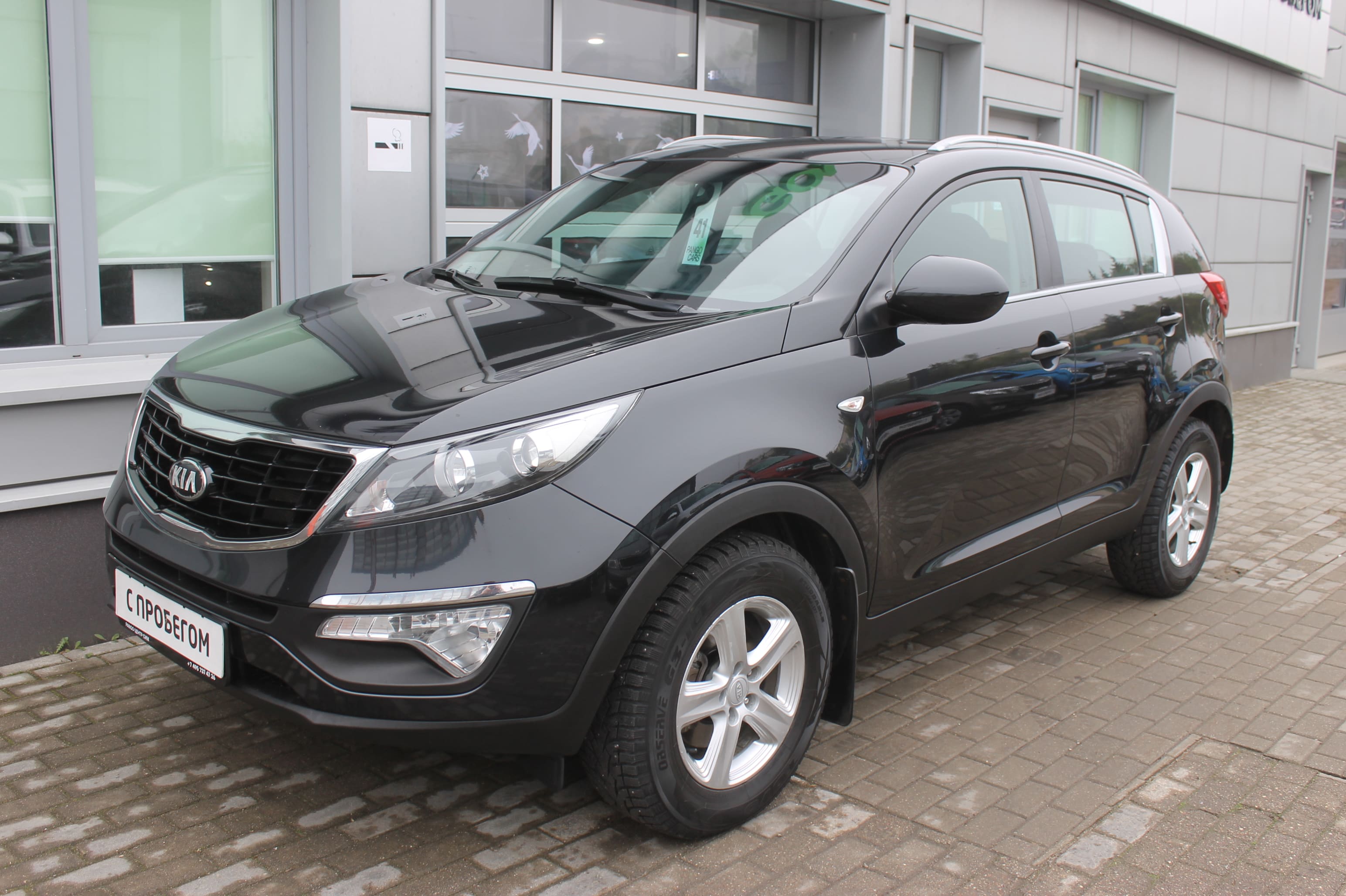 черный Kia Sportage, III 2.0 AT (150 л.с.) 2014