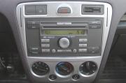 красный Ford Fusion 1.4 MT (80 л.с.) 2009 фото 19