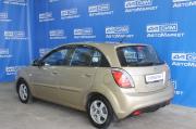бежевый Kia Rio 1.4 AT (97 л.с.) 2010 фото 5