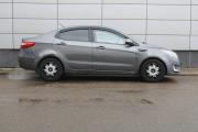 Серый Kia Rio 4-speed 1.6 AT (123 л.с.) 2012 фото 3