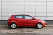 Красный Kia Rio 6-speed 1.6 MT (123 л.с.) 2014 фото 3