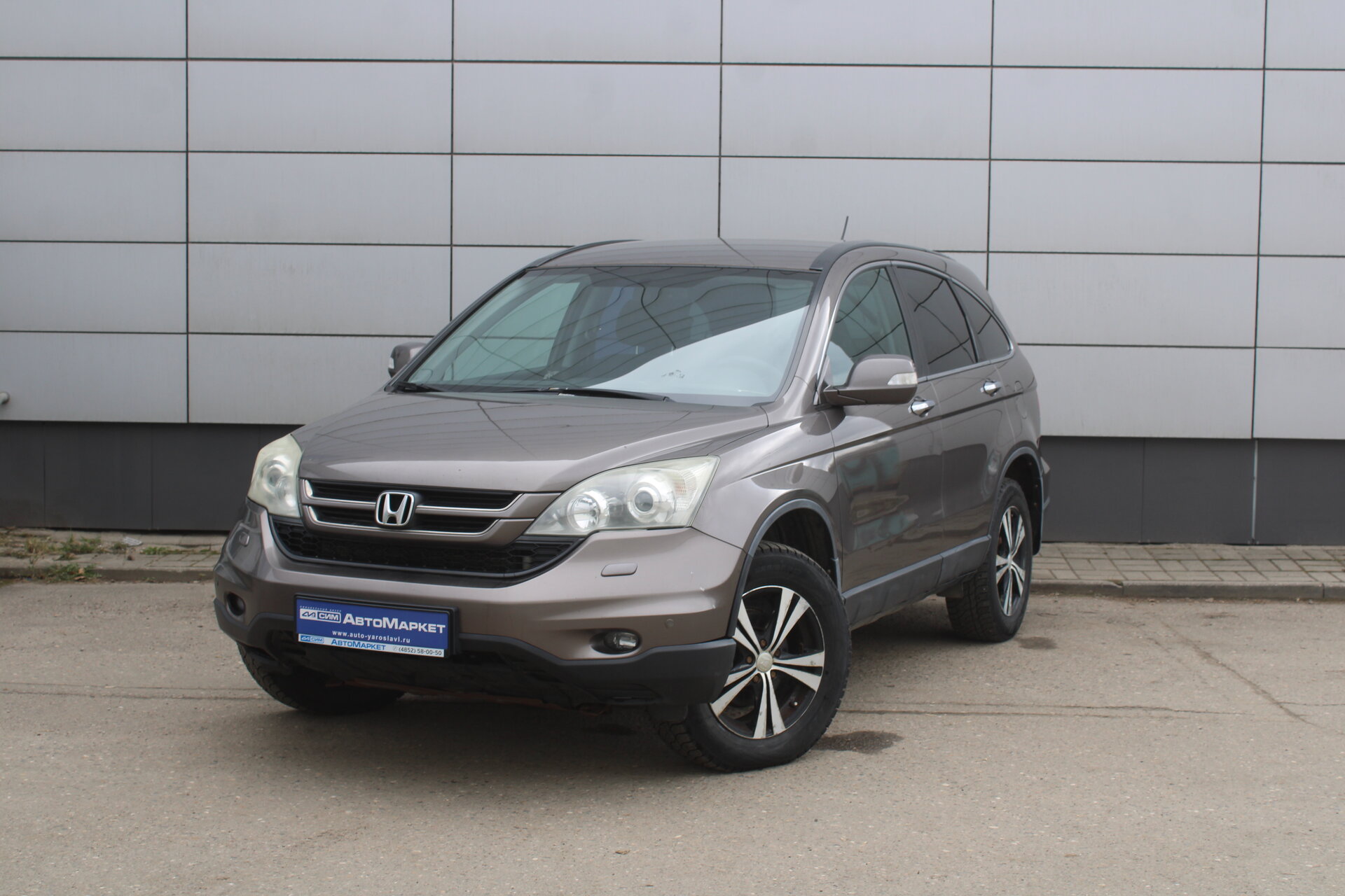 Бежевый Honda CR-V 2.0 AT (150 л.с.) 4WD 2012