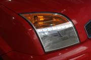 красный Ford Fusion 1.4 MT (80 л.с.) 2009 фото 12