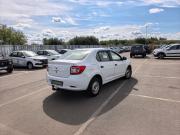 Белый Renault Logan 1.6 MT (82 л.с.) 2014 фото 1