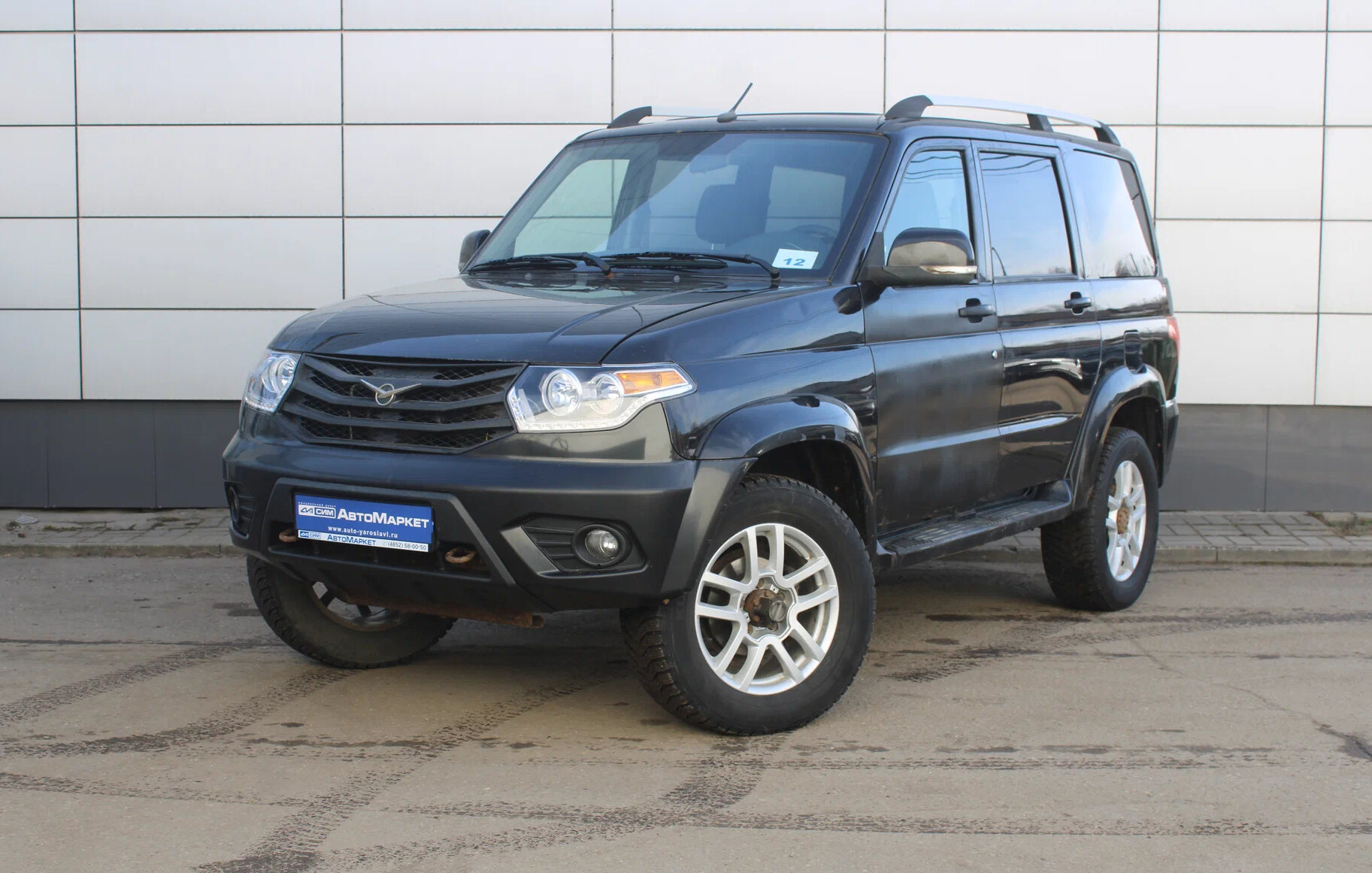 Черный УАЗ Патриот 2.7 MT (128 л.с.) 4WD 2014
