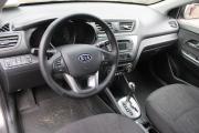 Серый Kia Rio 4-speed 1.6 AT (123 л.с.) 2012 фото 9