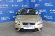 бежевый Kia Rio 1.4 AT (97 л.с.) 2010 фото 8