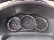 Белый Renault Logan 1.6 MT (82 л.с.) 2014 фото 10