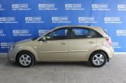 бежевый Kia Rio 1.4 AT (97 л.с.) 2010 фото 3