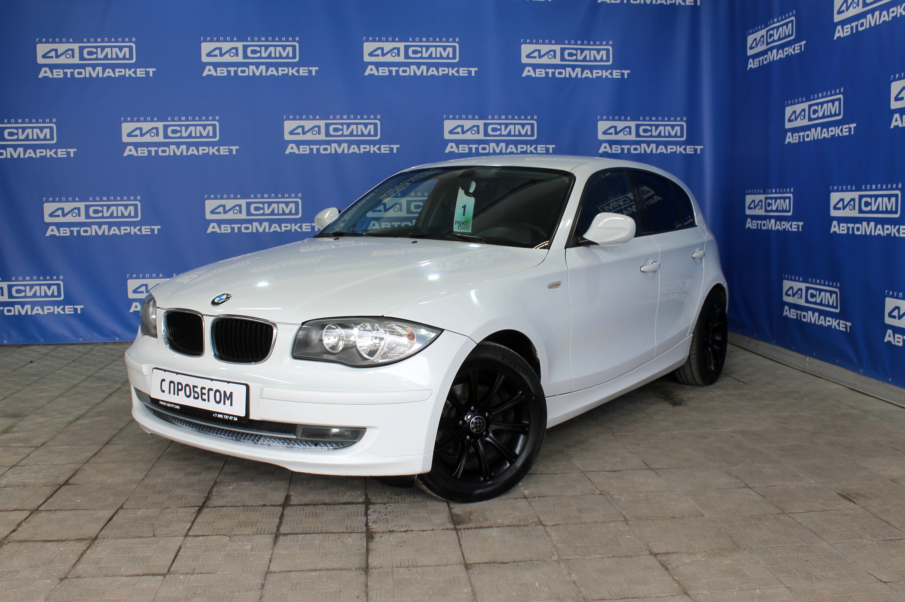 белый BMW 1 серии 116i 1.6 AT (115 л.с.) 2010