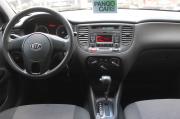 бежевый Kia Rio 1.4 AT (97 л.с.) 2010 фото 12