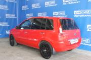 красный Ford Fusion 1.4 MT (80 л.с.) 2009 фото 5