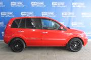 красный Ford Fusion 1.4 MT (80 л.с.) 2009 фото 2