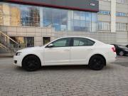белый Skoda Octavia 1.2 MT (105 л.с.) 2013 фото 1