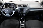 Белый Kia Rio 1.6 AT (123 л.с.) 2016 фото 8