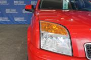 красный Ford Fusion 1.4 MT (80 л.с.) 2009 фото 11