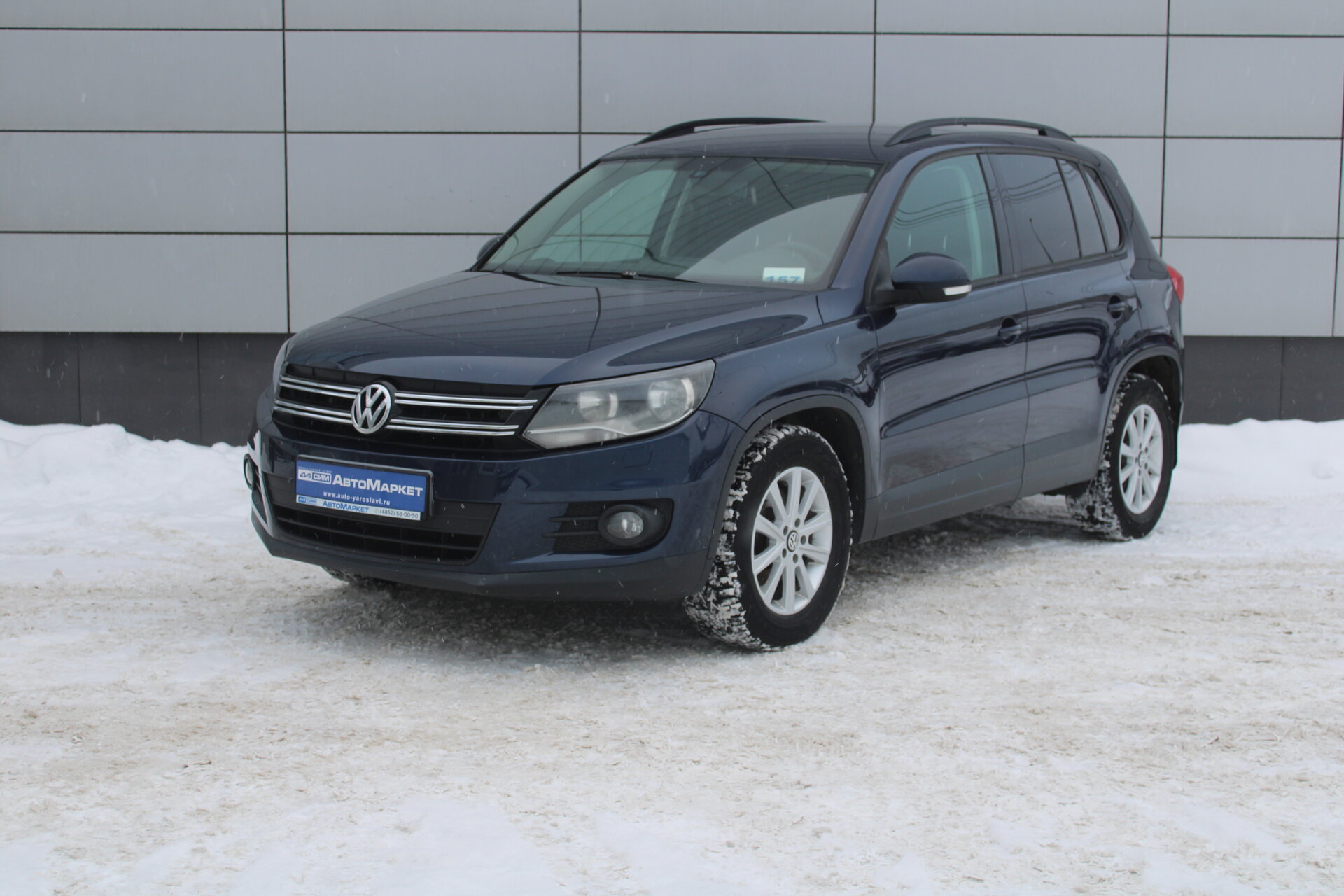 Синий Volkswagen Tiguan 1.4 MT (122 л.с.) 2011
