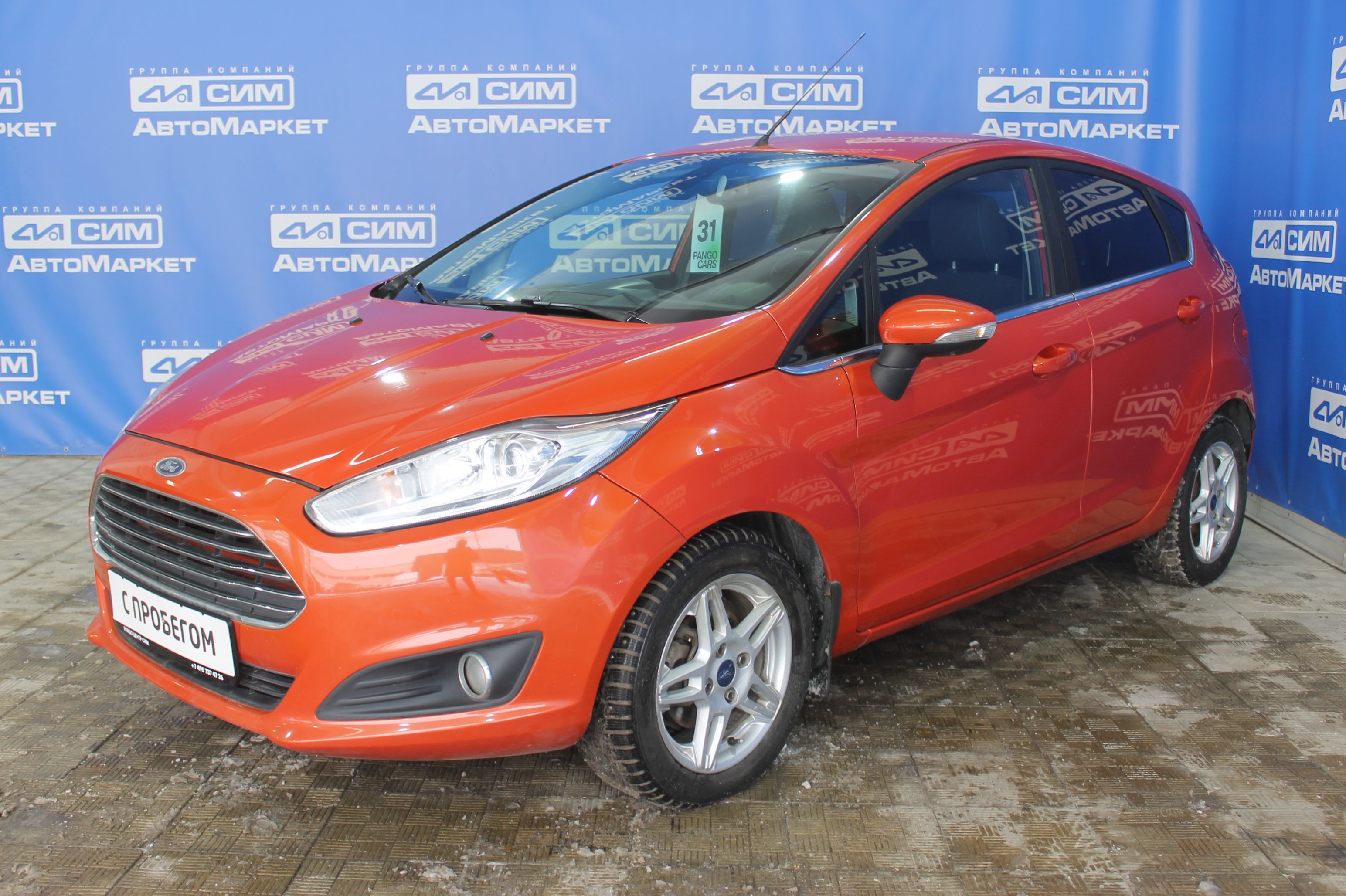 оранжевый Ford Fiesta 1.6 AMT (105 л.с.) 2015