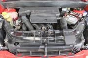 красный Ford Fusion 1.4 MT (80 л.с.) 2009 фото 9
