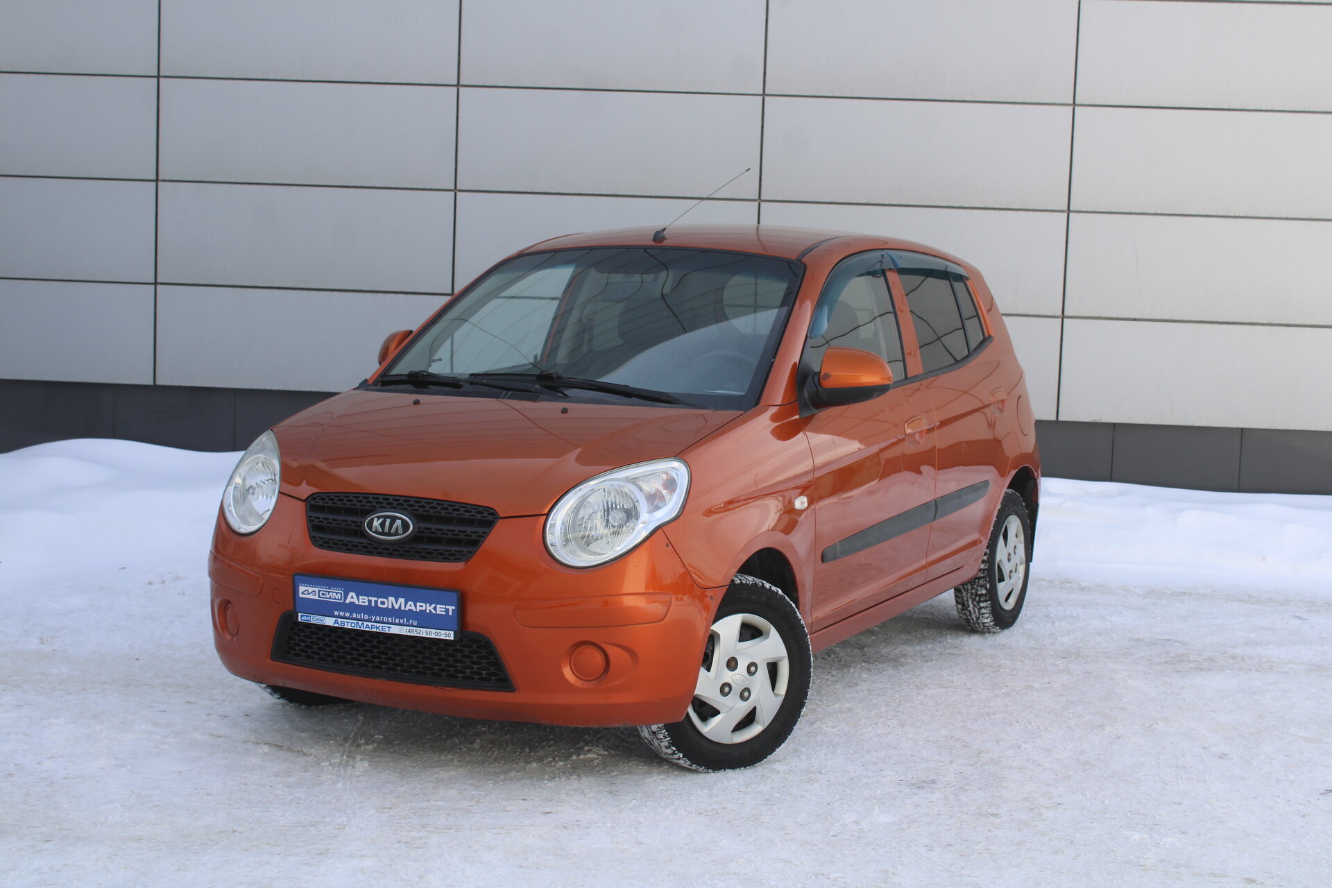 Оранжевый Kia Picanto, I Рестайлинг 1.0 MT (60 л.с.) 2009