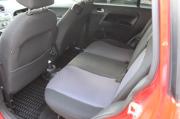 красный Ford Fusion 1.4 MT (80 л.с.) 2009 фото 16