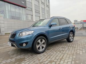 голубой Hyundai Santa Fe 2.4 AT (174 л.с.) 4WD 2011