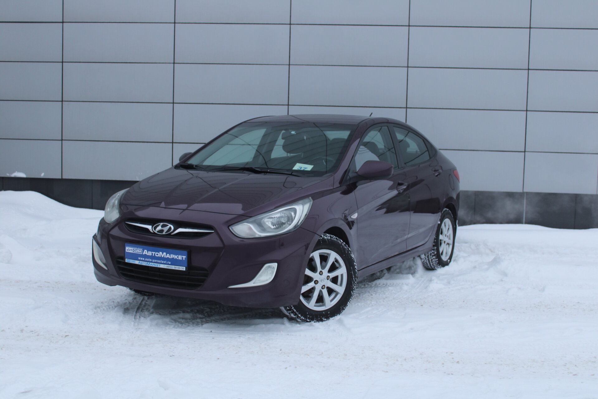 Фиолетовый Hyundai Solaris 1.4 AT (107 л.с.) 2011